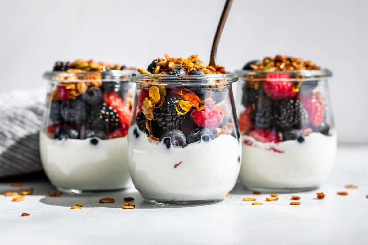 Image of three granola pots on a marble top